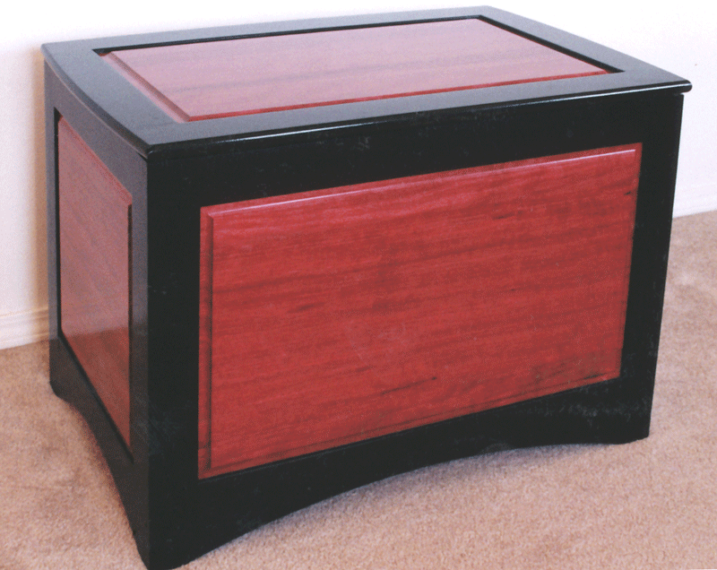 Photo of blanket chest in purple heart and ebonized walnut