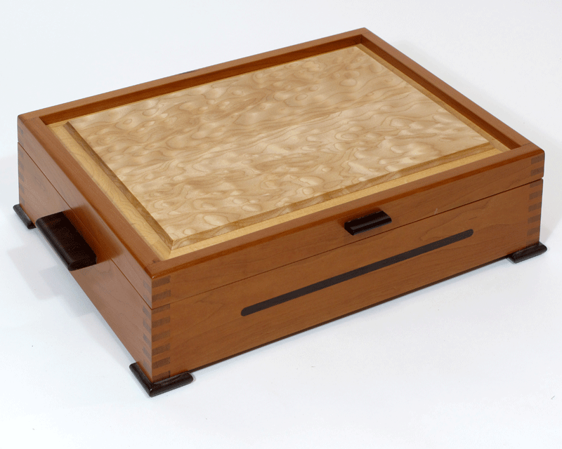 Photo of large cherry jewelry box with curly maple top