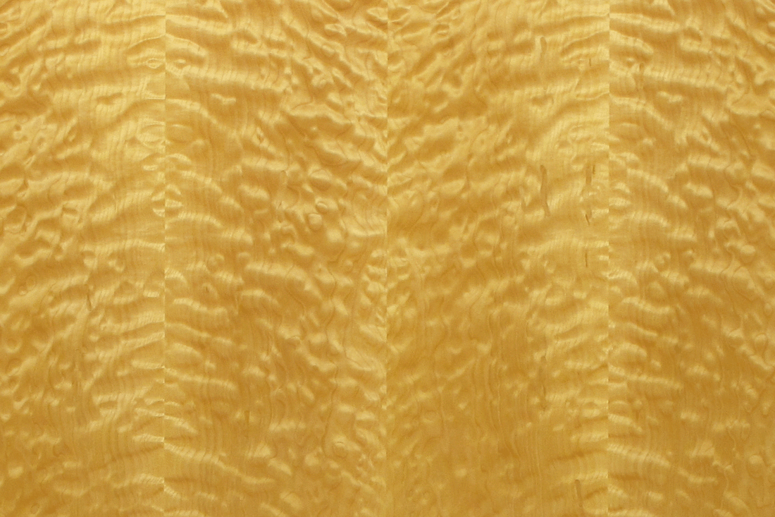 Photo of bookmatched quilted maple veneer