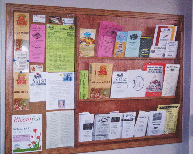 Photo of bulletin board and pamphlet racks