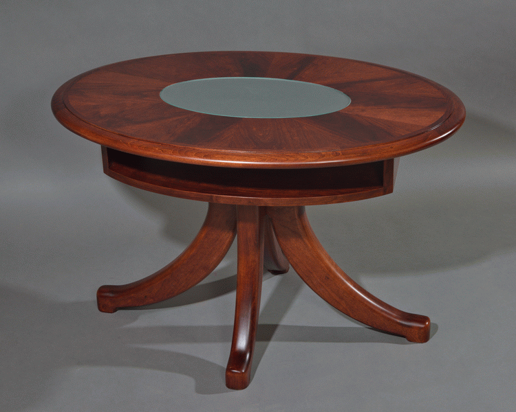 Photo of elliptical cherry coffee table with solid rim