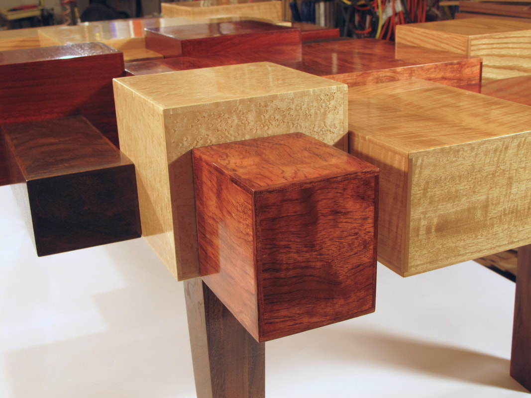 Closeup of Veneered boxes in Ultra Modern table